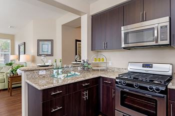 Slab granite countertop w/ bullnose edge in kitchens